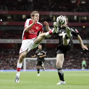 Jack Wilshere (Arsenal) Gary Naysmith (Sheffield) Jack Wilshere (Arsenal) Gary Naysmith (Sheffield)