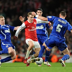 Jack Wilshere (Arsenal) Grant Leadbitter and Damien Delaney (Ipswich). Arsenal 3