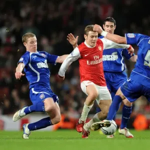 Jack Wilshere (Arsenal) Grant Leadbitter and Damien Delaney (Ipswich). Arsenal 3 Jack Wilshere (Arsenal) Grant Leadbitter and Damien Delaney (Ipswich). Arsenal 3