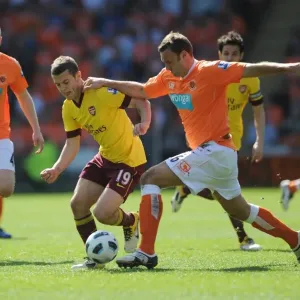 Jack Wilshere (Arsenal) Ian Evatt (Blackpool). Blackpool 1: 3 Arsenal, Barclays Premier League