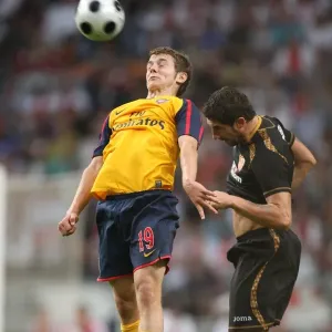 Jack Wilshere (Arsenal) Ivica Dragutinovic (Seville) Jack Wilshere (Arsenal) Ivica Dragutinovic (Seville)
