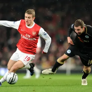 Jack Wilshere (Arsenal) James Mcarthur (Wigan). Arsenal 2: 0 Wigan Athletic