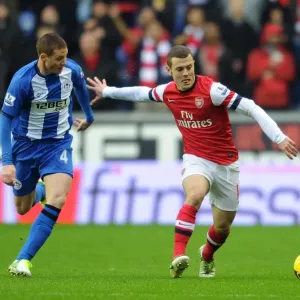 Jack Wilshere (Arsenal) James McCarthy (Wigan). Wigan Athletic 0: 1 Arsenal. Barclays Premier League