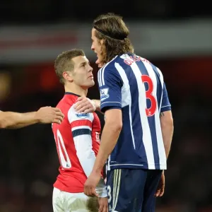 Jack Wilshere (Arsenal) Jonas Olsson (WBA). Arsenal 2: 0 West Bromwich Albion. Barclays