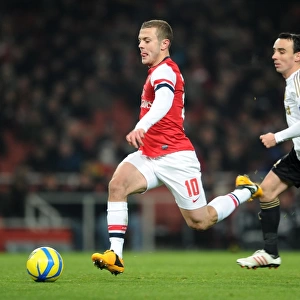 Jack Wilshere (Arsenal) Leon Britton (Swansea). Arsenal 1: 0 Swansea City. FA Cup 3rd Round replay
