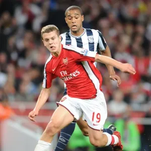 Jack Wilshere (Arsenal) Luke Moore (WBA) Jack Wilshere (Arsenal) Luke Moore (WBA)