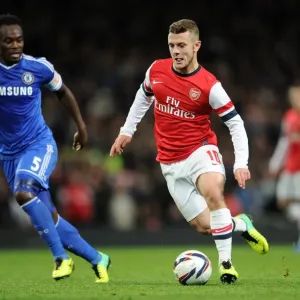 Jack Wilshere (Arsenal) Michael Essien (Chelsea). Arsenal 0: 2 Chelsea. Capital One Cup 4th Round Jack Wilshere (Arsenal) Michael Essien (Chelsea). Arsenal 0: 2 Chelsea. Capital One Cup 4th Round