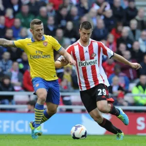 Jack Wilshere (Arsenal) Modibo Diakite and Valentin Roberge (Sunderland). Sunderland 1: 3 Arsenal Jack Wilshere (Arsenal) Modibo Diakite and Valentin Roberge (Sunderland). Sunderland 1: 3 Arsenal