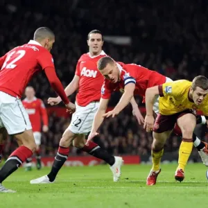 Jack Wilshere (Arsenal) Nemanja Vidic and Chris Smalling (Man Utd). Manchester United 2