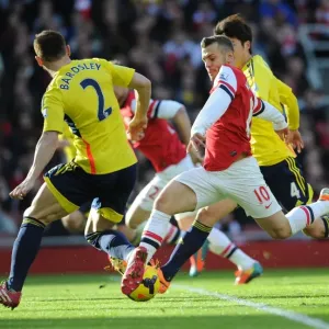 Jack Wilshere (Arsenal) Phil Bardsley (Sunderland). Arsenal 4: 1 Sunderland. Barclays Premier League Jack Wilshere (Arsenal) Phil Bardsley (Sunderland). Arsenal 4: 1 Sunderland. Barclays Premier League