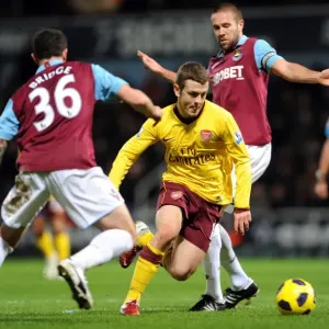Jack Wilshere (Arsenal) Wayne Bridge and Matthew Upson (West Ham). West Ham United 0