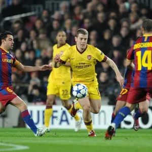 Jack WIlshere (Arsenal) Xavi (Barcelona). Barcelona 3: 1 Arsenal. UEFA Champions League