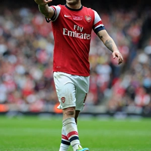 Jack Wilshere: Arsenal's Midfield Maestro in Action Against Stoke City, Premier League 2013-14