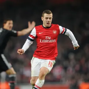 Jack Wilshere: Arsenal's Midfield Maestro in Action against Bayern Munich, 2012-13 UEFA Champions League