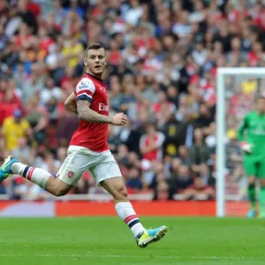 Jack Wilshere: Arsenal's Midfield Mastermind in Action against Stoke City, Premier League 2013-14 Jack Wilshere: Arsenal's Midfield Mastermind in Action against Stoke City, Premier League 2013-14