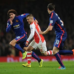 Jack Wilshere Battles Past Fellaini and McNair in Arsenal vs Manchester United Clash (2014-15)