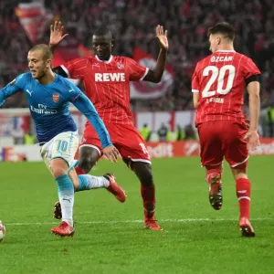 Jack Wilshere Clashes with Guirassy and Ozcan in Arsenal's Europa League Battle against FC Koln Jack Wilshere Clashes with Guirassy and Ozcan in Arsenal's Europa League Battle against FC Koln