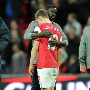Jack Wilshere Consoled by Emmanuel Eboue: Arsenal's Bittersweet Carling Cup Final Moment Jack Wilshere Consoled by Emmanuel Eboue: Arsenal's Bittersweet Carling Cup Final Moment