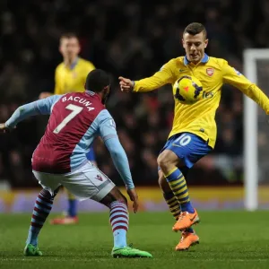 Jack Wilshere Faces Off Against Leandro Bacuna: Aston Villa vs. Arsenal, Premier League 2013-14 Jack Wilshere Faces Off Against Leandro Bacuna: Aston Villa vs. Arsenal, Premier League 2013-14