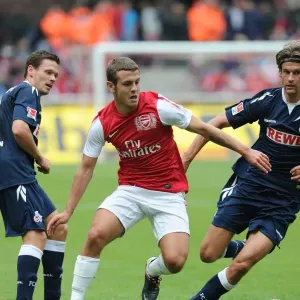 Jack Wilshere Faces Off Against Martin Lanig in Cologne Friendly