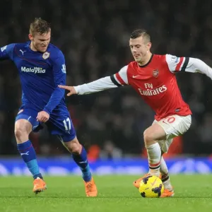 Jack Wilshere Outmaneuvers Aron Gunnarsson: Arsenal vs. Cardiff City, Premier League, 2013-14 Jack Wilshere Outmaneuvers Aron Gunnarsson: Arsenal vs. Cardiff City, Premier League, 2013-14