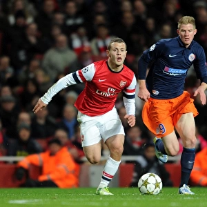 Jack Wilshere Outpaces Gaetan Charbonnier: Arsenal vs Montpellier, UEFA Champions League, 2012