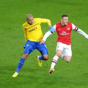 Jack Wilshere Outpaces Leon Clarke in FA Cup Showdown: Arsenal vs. Coventry City (2013-14) Jack Wilshere Outpaces Leon Clarke in FA Cup Showdown: Arsenal vs. Coventry City (2013-14)