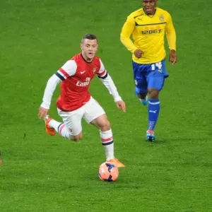Jack Wilshere Outruns Franck Moussa in FA Cup Clash: Arsenal vs Coventry City, 2014 Jack Wilshere Outruns Franck Moussa in FA Cup Clash: Arsenal vs Coventry City, 2014
