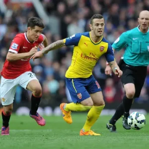 Jack Wilshere Outsmarts Ander Herrera: Intense Premier League Clash between Manchester United and Arsenal (2014-15) Jack Wilshere Outsmarts Ander Herrera: Intense Premier League Clash between Manchester United and Arsenal (2014-15)