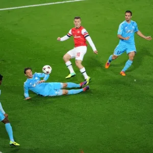 Jack Wilshere Scores Dramatic Goal Past Lucas Mendes and Nicolas N'Koulou: Arsenal vs. Olympique de Marseille, UEFA Champions League, 2013 Jack Wilshere Scores Dramatic Goal Past Lucas Mendes and Nicolas N'Koulou: Arsenal vs. Olympique de Marseille, UEFA Champions League, 2013