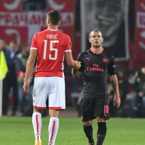 Jack Wilshere and Srdan Babic Exchange Handshakes: Crvena Zvezda vs. Arsenal FC, UEFA Europa League 2017-18