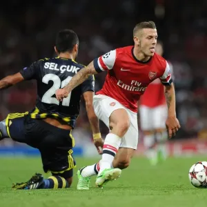 Jack Wilshere vs. Selcuk Sahin: Arsenal's Midfield Battle in Champions League Play-offs (Arsenal v Fenerbahce 2013-14)