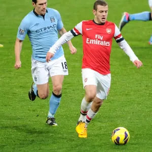 Jack Wilshere vs. Gareth Barry: Intense Midfield Battle at Arsenal vs. Manchester City (2012-13) Jack Wilshere vs. Gareth Barry: Intense Midfield Battle at Arsenal vs. Manchester City (2012-13)