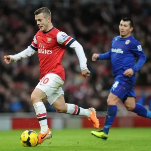 Jack Wilshere vs. Gary Medel: Intense Battle in Arsenal v Cardiff City Premier League Clash Jack Wilshere vs. Gary Medel: Intense Battle in Arsenal v Cardiff City Premier League Clash