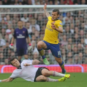Jack Wilshere vs John Arne Riise: Battle at Craven Cottage, Fulham vs Arsenal, Premier League 2013-14 Jack Wilshere vs John Arne Riise: Battle at Craven Cottage, Fulham vs Arsenal, Premier League 2013-14