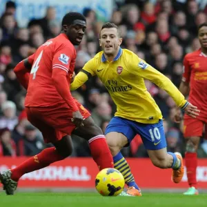Jack Wilshere vs. Kolo Toure: Intense Rivalry at Anfield (Liverpool v Arsenal, 2013-14) Jack Wilshere vs. Kolo Toure: Intense Rivalry at Anfield (Liverpool v Arsenal, 2013-14)