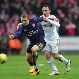 Jack Wilshere vs. Leon Britton: Battle at the Liberty Stadium - Swansea v Arsenal, FA Cup 3rd Round Jack Wilshere vs. Leon Britton: Battle at the Liberty Stadium - Swansea v Arsenal, FA Cup 3rd Round