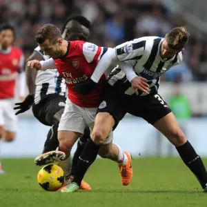 Jack Wilshere vs. Mathieu Debuchy: Intense Rivalry in Newcastle United vs. Arsenal Football Clash (2013-14) Jack Wilshere vs. Mathieu Debuchy: Intense Rivalry in Newcastle United vs. Arsenal Football Clash (2013-14)