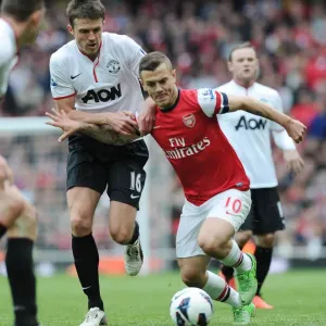 Jack Wilshere vs Michael Carrick: Battle in the Midfield - Arsenal v Manchester United, Premier League 2012-13 Jack Wilshere vs Michael Carrick: Battle in the Midfield - Arsenal v Manchester United, Premier League 2012-13