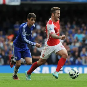 Jack Wilshere vs. Oscar: Battle in the Heart of the Premier League Clash Between Chelsea and Arsenal (2014-15)