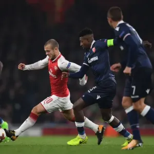 Jack Wilshere vs. Richmond Donald: Arsenal's Clash in Europa League Action