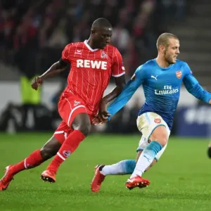 Jack Wilshere vs. Sehrou Guirassy: Battle in the Europa League between Arsenal and 1. FC Koln Jack Wilshere vs. Sehrou Guirassy: Battle in the Europa League between Arsenal and 1. FC Koln