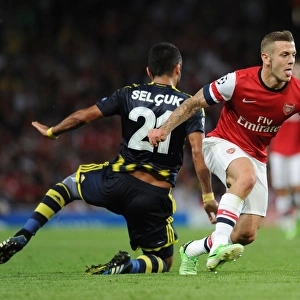 Jack Wilshere vs. Selcuk Sahin: Arsenal's Midfield Battle in Champions League Play-offs (Arsenal v Fenerbahce 2013-14)
