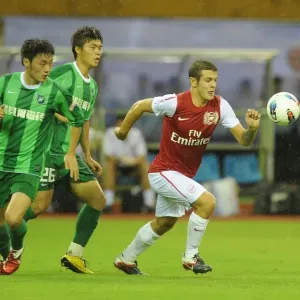 Jack Wilshere vs. Yang Chen and Wang Quan: Hangzhou Greentown vs. Arsenal, China, 2011 Jack Wilshere vs. Yang Chen and Wang Quan: Hangzhou Greentown vs. Arsenal, China, 2011