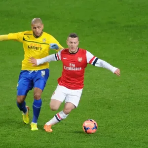 Jack Wilshere's Blazing Speed: Outpacing Leon Clarke in Arsenal's FA Cup Victory Jack Wilshere's Blazing Speed: Outpacing Leon Clarke in Arsenal's FA Cup Victory