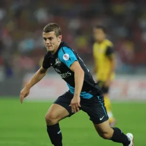 Jack Wilshere's Stellar Performance: Arsenal Thrashes Malaysia XI 4-0 Jack Wilshere's Stellar Performance: Arsenal Thrashes Malaysia XI 4-0