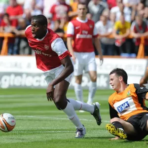 Jay Emmanuel Thomas (Arsenal) Mark Byrne (Barnet). Barnet 0: 4 Arsenal, Pre season friendly Jay Emmanuel Thomas (Arsenal) Mark Byrne (Barnet). Barnet 0: 4 Arsenal, Pre season friendly