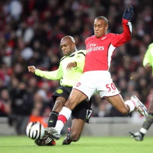 Jay Simpson (Arsenal) Emmerson Boyce (Wigan)