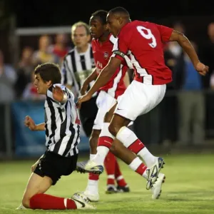 Jay Simpson scores Arsenals 3rd goal under pressure from Jack Bradshaw (Maidenhead)