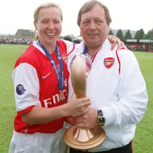 Jayne Ludlow (Arsenal) and Arsenal Manager Vic Akers with the European Trophy Jayne Ludlow (Arsenal) and Arsenal Manager Vic Akers with the European Trophy